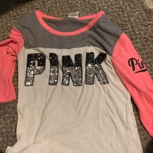 It’s pink and white and has sparkly lettering to small for me now